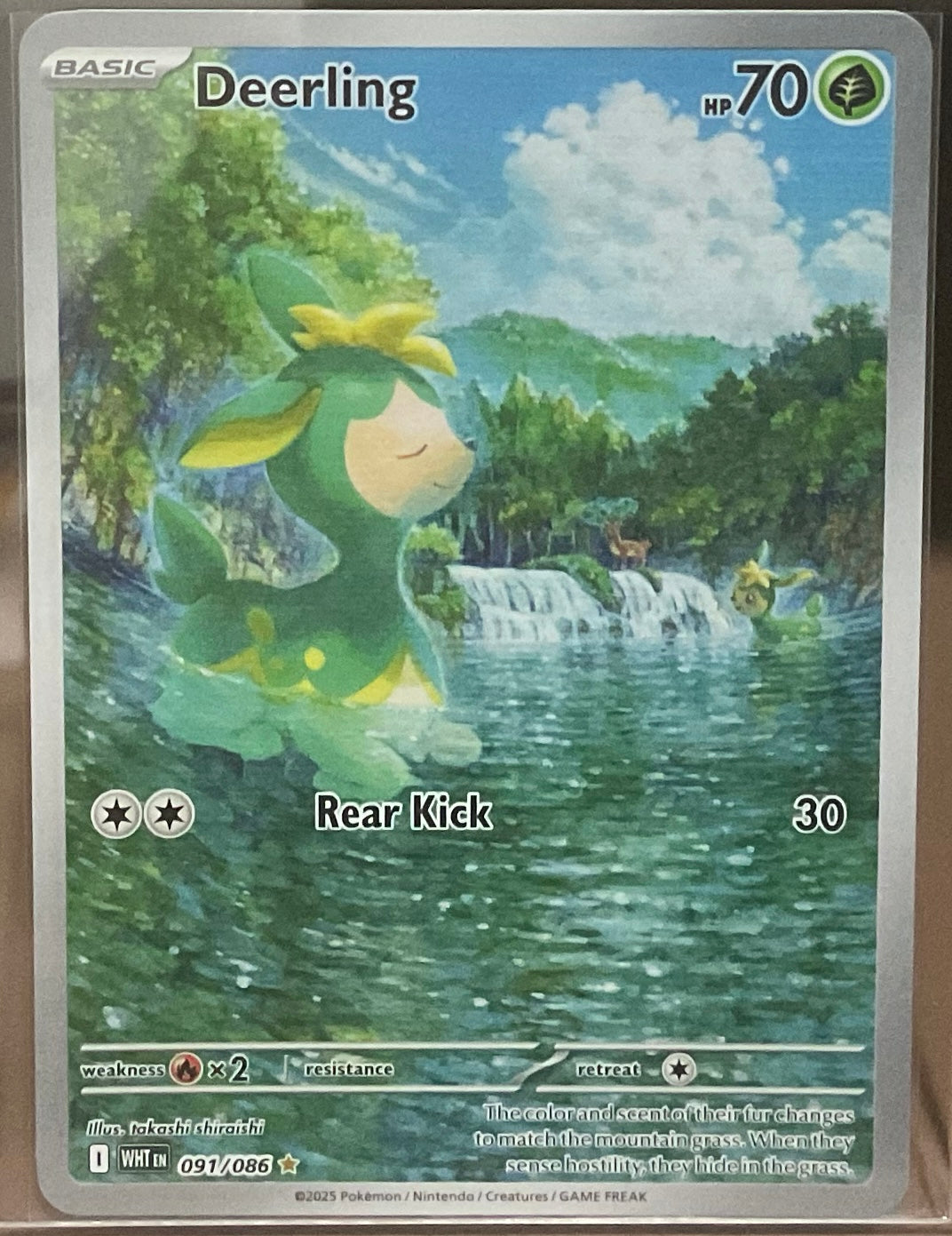 Pokémon trading card featuring a green creature named Deerling with a scenic background.