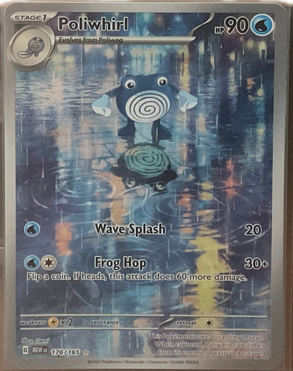 Poliwhirl card from a trading card game with character illustration and text.