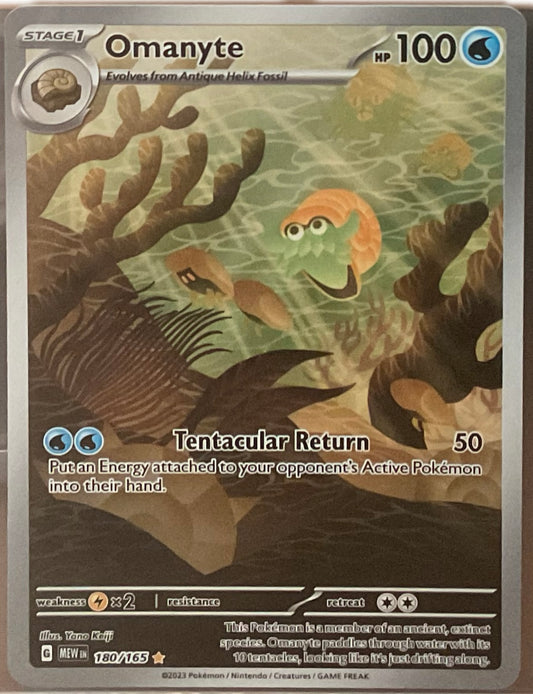Pokémon trading card featuring Omanyte with detailed artwork and text.
